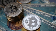 비트코인, 예상 웃도는 美 물가 지표에 급락…한때 7만 달러 아래로